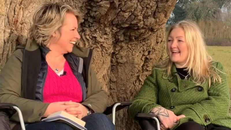 Rev. Helen James and Kelly Peacey sit under an Oak Tree in Deerhurst and prepare for a ceremony.